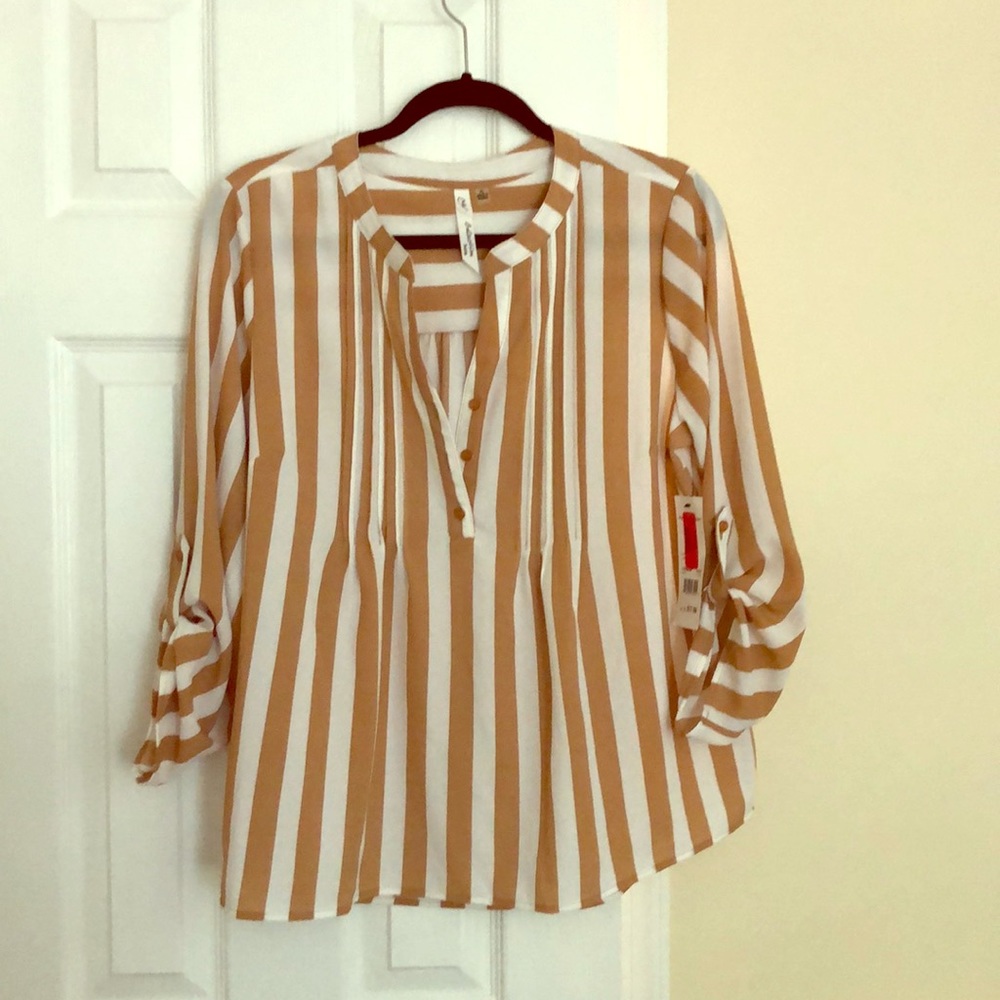 Never worn blouse- with vertical stripes!!!